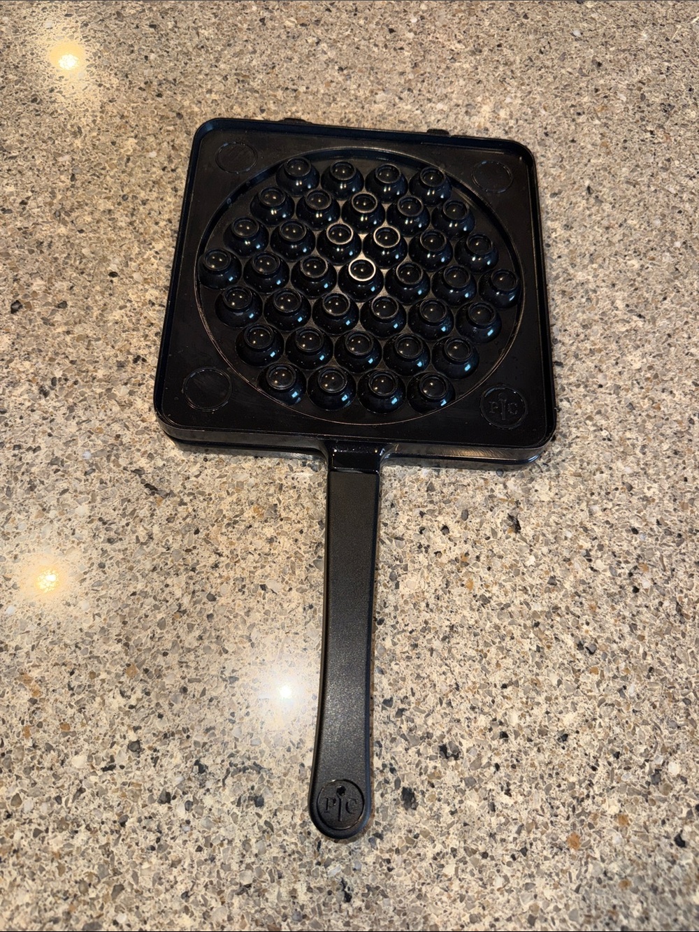 The Pampered Chef Black Cast Iron Bubble Waffle Pan